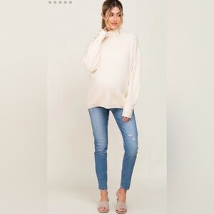 Pink Blush slightly distressed medium blue maternity jeans